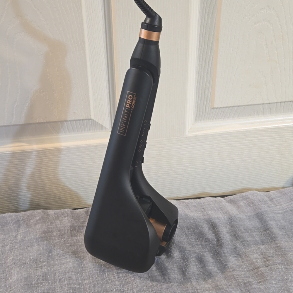 By:Conair-InfinitiPro Meta E Curl Secret,can make waves,or flat iron hair.